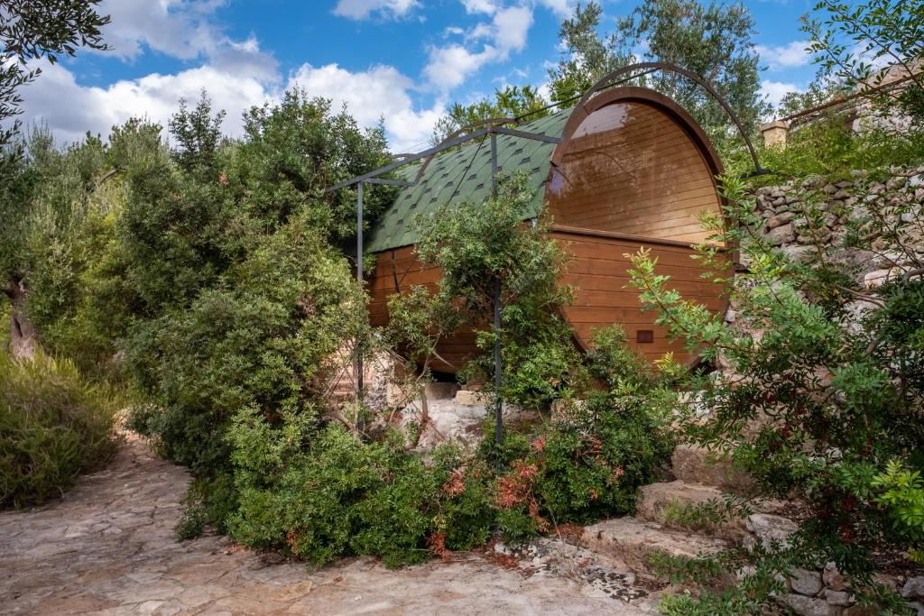 Zahrada ubytování "IL BOSCO" di POZZO VOLITO