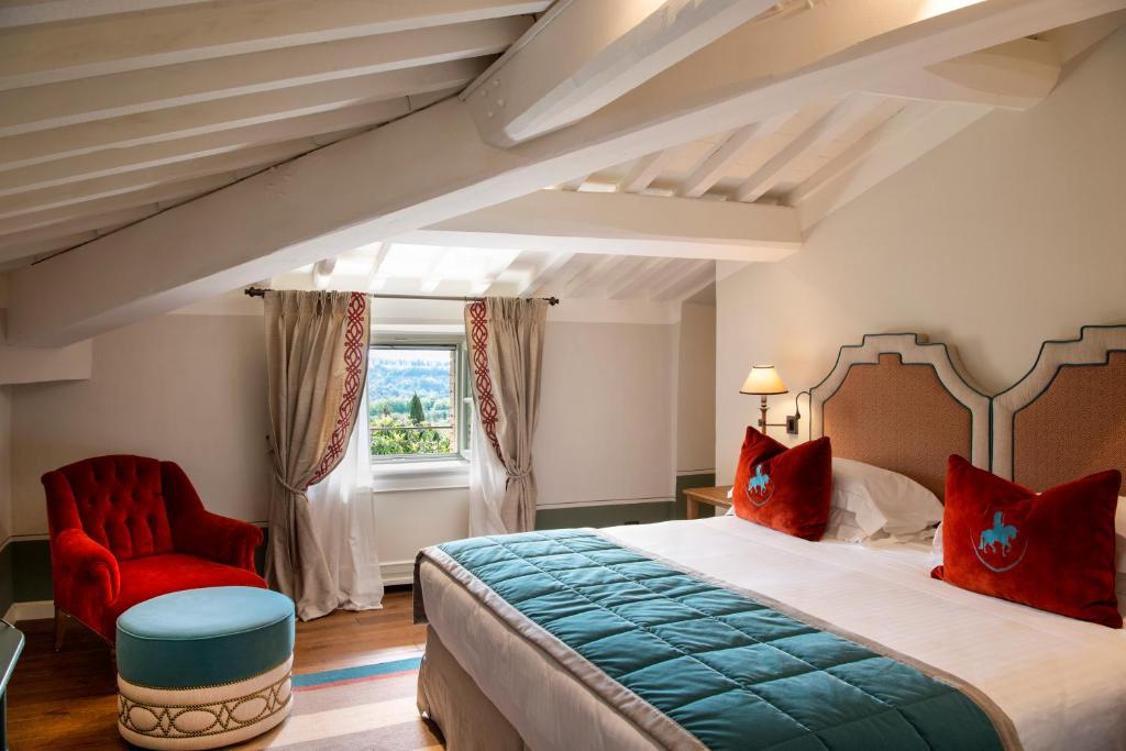 Postel nebo postele na pokoji v ubytování Borgo San Felice Resort