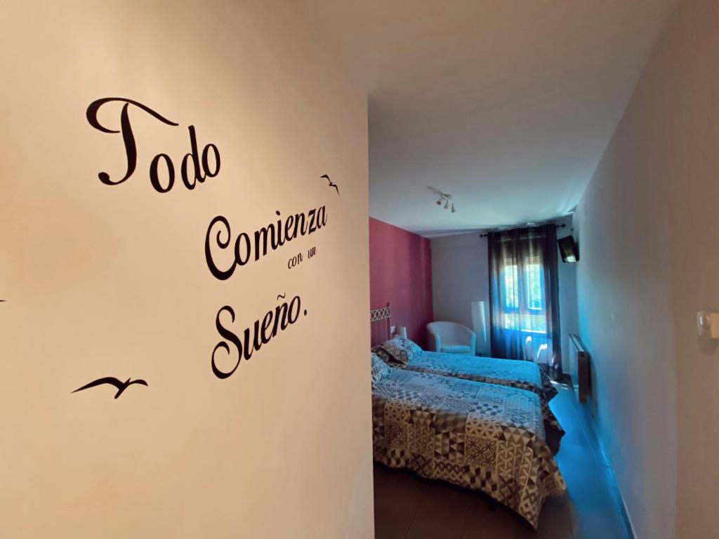 Cama o camas de una habitación en Hostal Casa Vispe