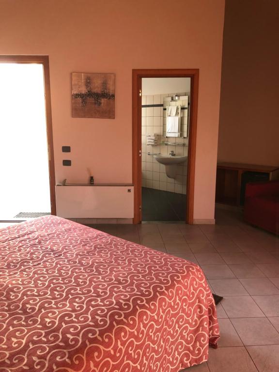 Postel nebo postele na pokoji v ubytování Albavillage Hotel Wellness & Camping