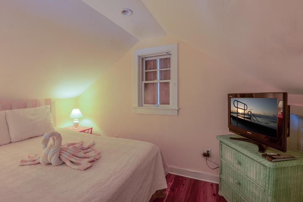 TV a/nebo společenská místnost v ubytování Key West Villas