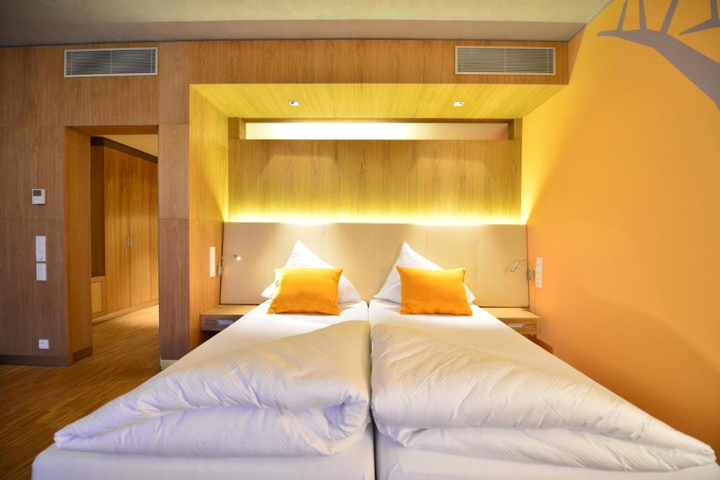 Postel nebo postele na pokoji v ubytování Antonie Hotel****superior