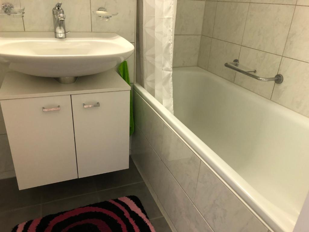 Koupelna v ubytování Wohnung mit See und Bergsicht im vier Sterne Hotel