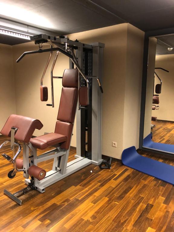Fitness centrum a/nebo fitness zařízení v ubytování Wohnung mit See und Bergsicht im vier Sterne Hotel