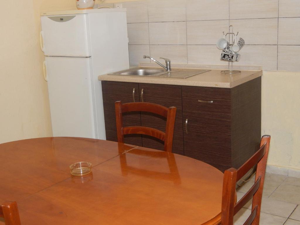 Kuchyň nebo kuchyňský kout v ubytování Filia Apartments