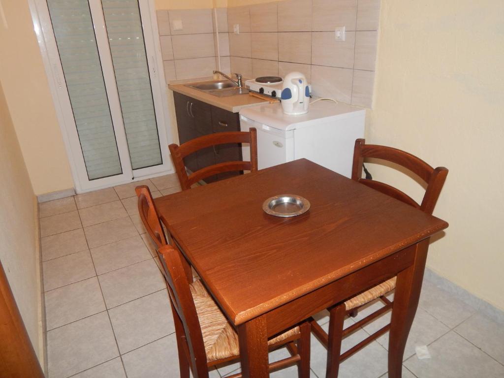 Kuchyň nebo kuchyňský kout v ubytování Filia Apartments