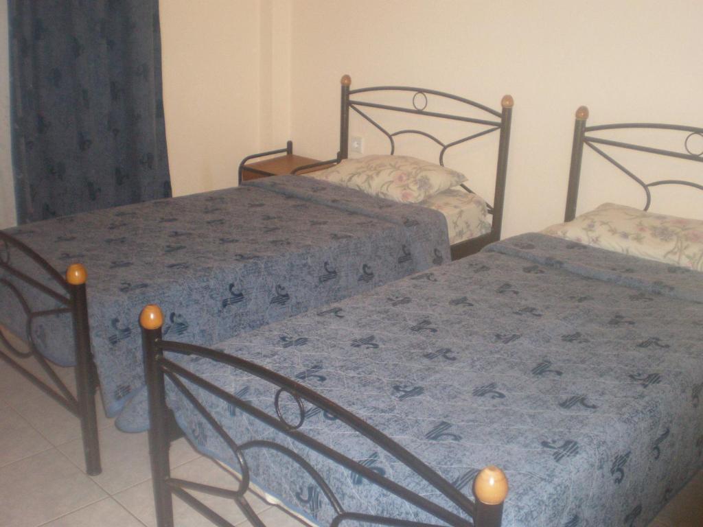 Postel nebo postele na pokoji v ubytování Filia Apartments