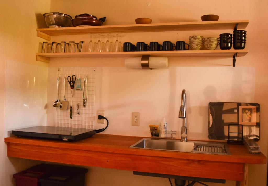 Kuchyň nebo kuchyňský kout v ubytování Hostel&Cafe Farolito
