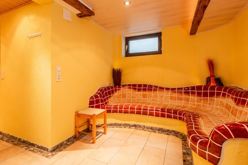 Postel nebo postele na pokoji v ubytování Landhaus Blaubeerhügel
