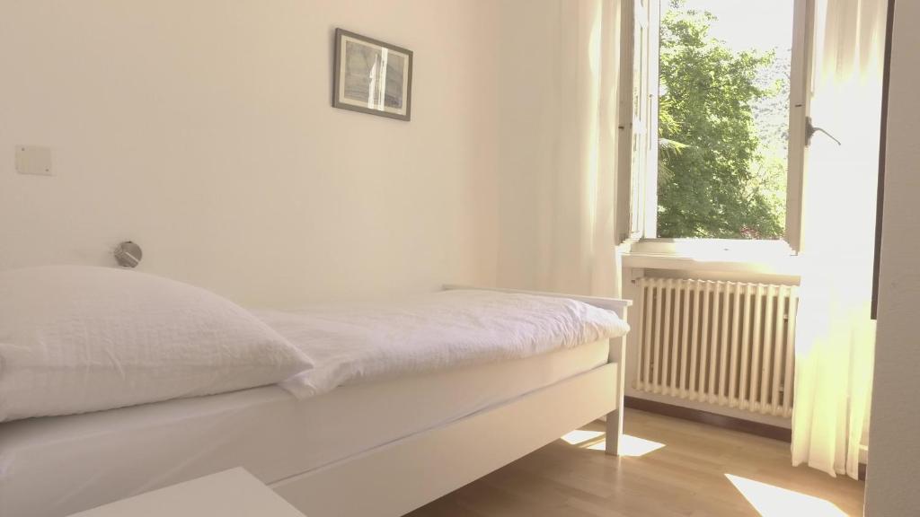 Postel nebo postele na pokoji v ubytování Hotel Fonte dei Fiori