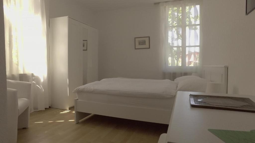 Postel nebo postele na pokoji v ubytování Hotel Fonte dei Fiori
