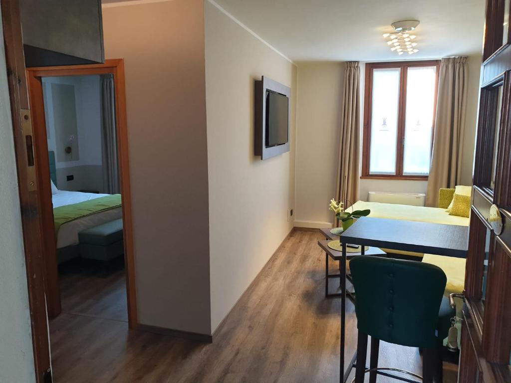 Postel nebo postele na pokoji v ubytování Hotel and Wellness Patriarca