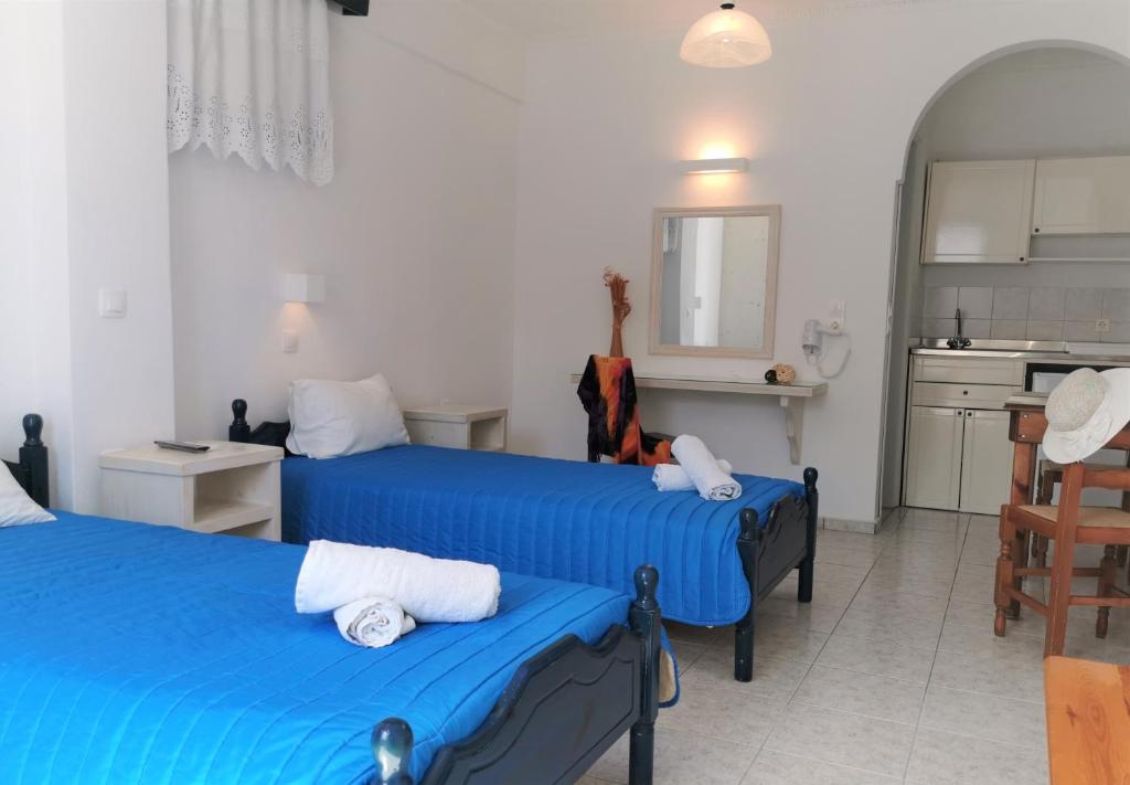 Letto o letti in una camera di Aretousa Villas