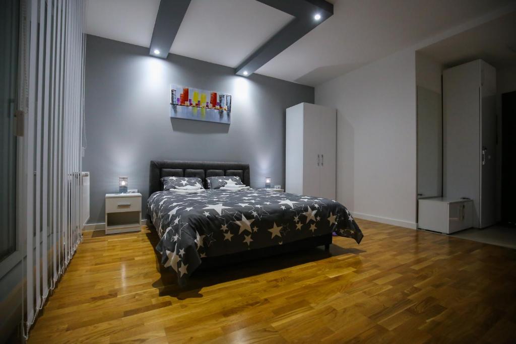 Postel nebo postele na pokoji v ubytování MANIROSI 3 apartman