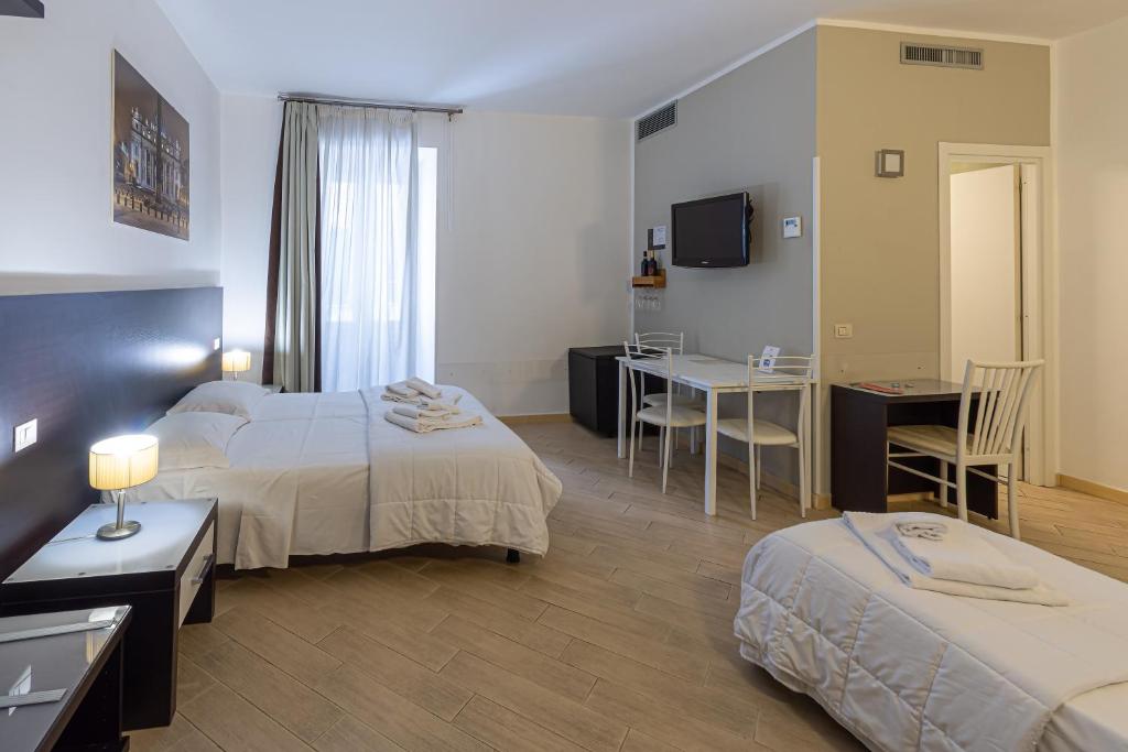 Posteľ alebo postele v izbe v ubytovaní B&B A Picture of Rome