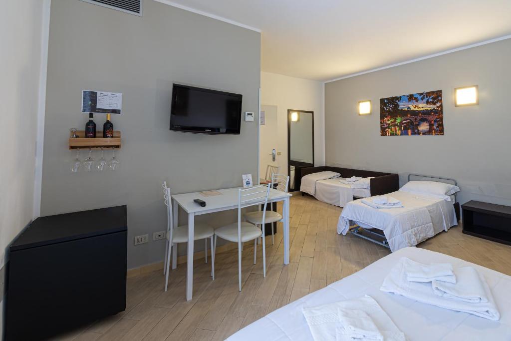 Posteľ alebo postele v izbe v ubytovaní B&B A Picture of Rome