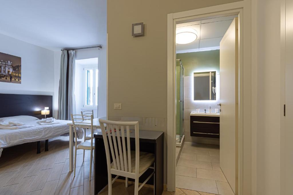 Posteľ alebo postele v izbe v ubytovaní B&B A Picture of Rome