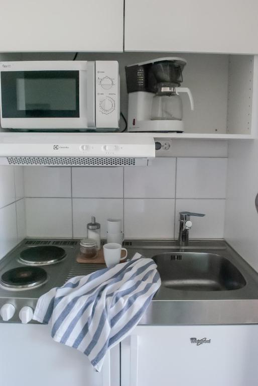 Kuchyň nebo kuchyňský kout v ubytování Nordanå Gård
