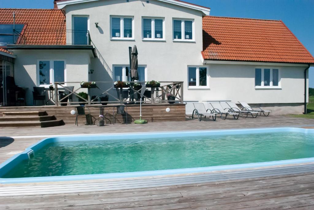 Bazén v ubytování Nordanå Gård nebo v jeho okolí