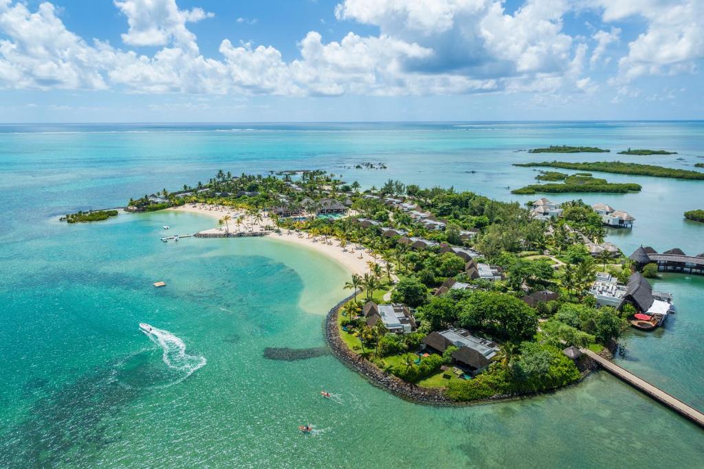 an aerial view of an island in the ocean at Four Seasons Resort Mauritius at Anahita in Beau Champ