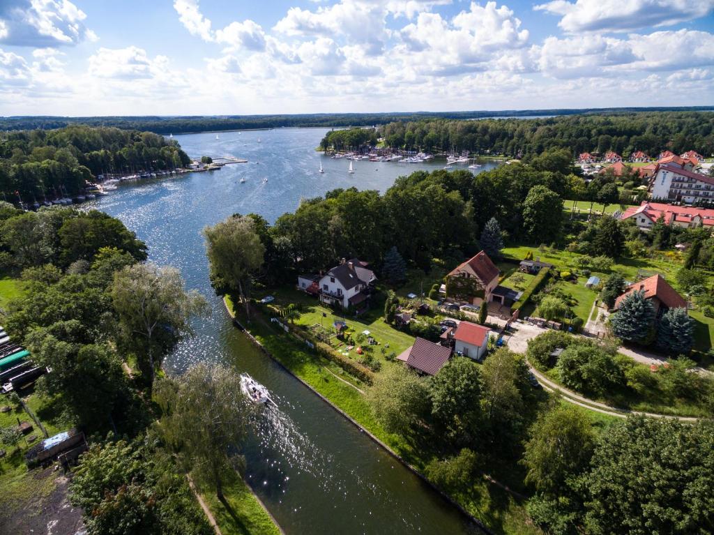 an aerial view of a river and a town at Domek Ewa in Giżycko
