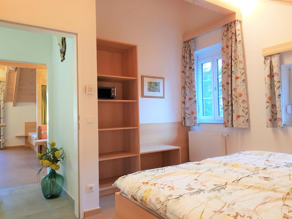 Postel nebo postele na pokoji v ubytování Villa Lilly - Luxus Appartements im Villenviertel