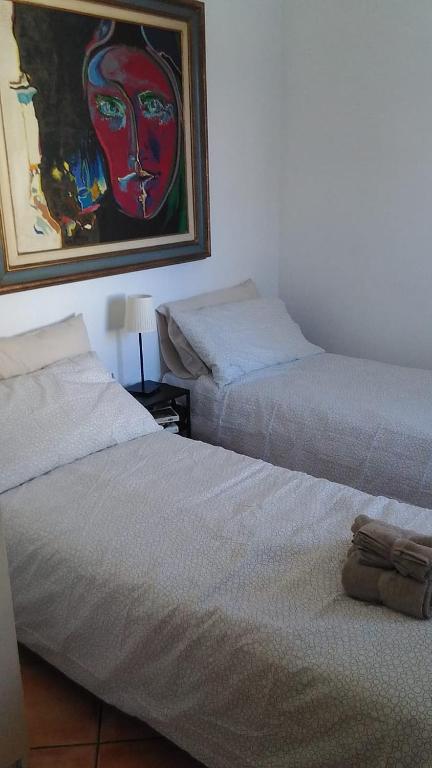 Posteľ alebo postele v izbe v ubytovaní Bouganville A apartament B&B