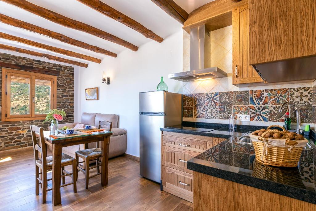 Kuchyňa alebo kuchynka v ubytovaní Apartamentos Entre Senderos