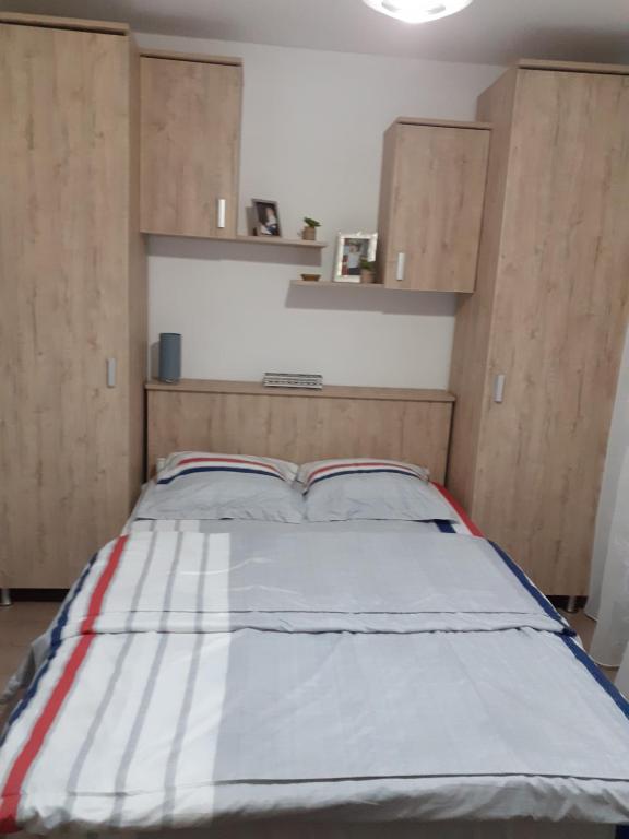 Katil atau katil-katil dalam bilik di Apartament particular