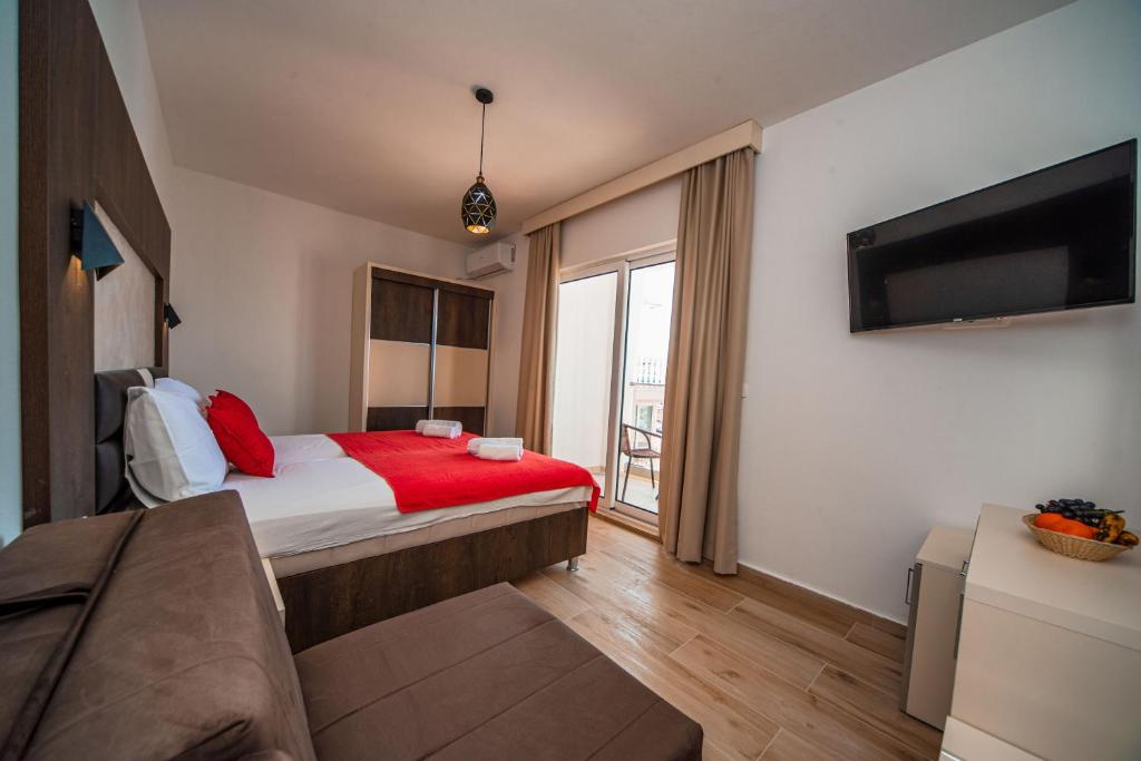 Postel nebo postele na pokoji v ubytování David Lux beach rooms
