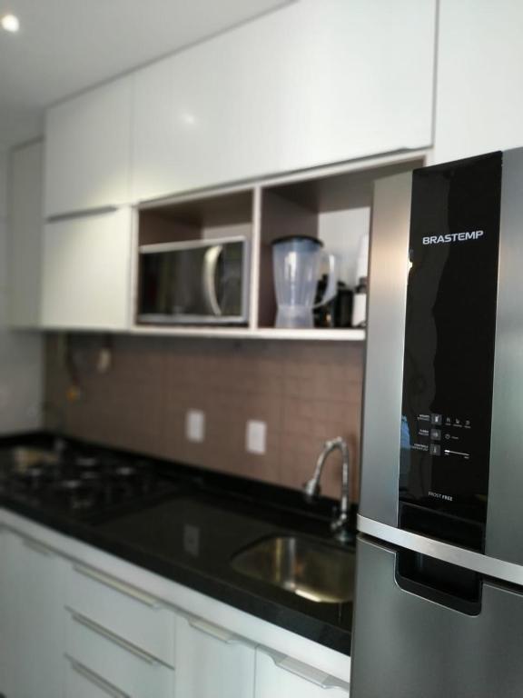  Flat Terreo Muro Alto Condomínio Clube com Sala Reversível para segundo quarto