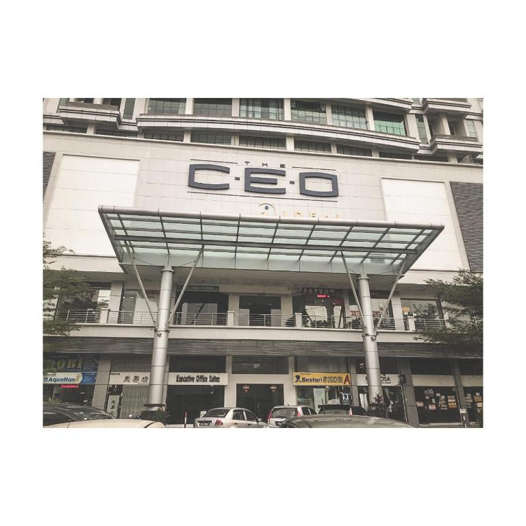 a building with a ce sign on the front of it at The ceo suites by Zenbnb in Bayan Lepas