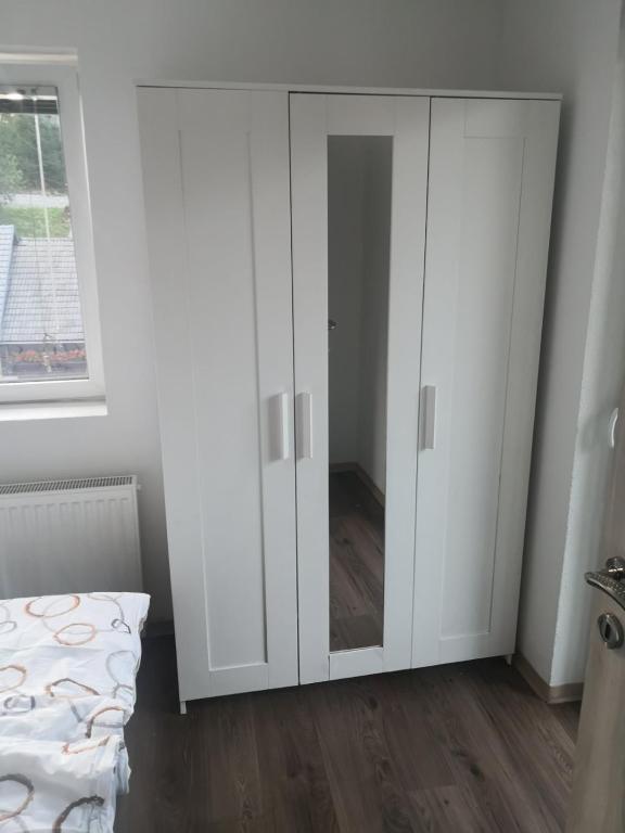 Postel nebo postele na pokoji v ubytování Apartma Alja Podkoren