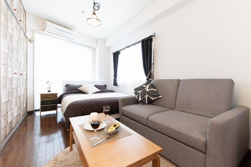 Χώρος καθιστικού στο Omotenashi House Kawaguchi