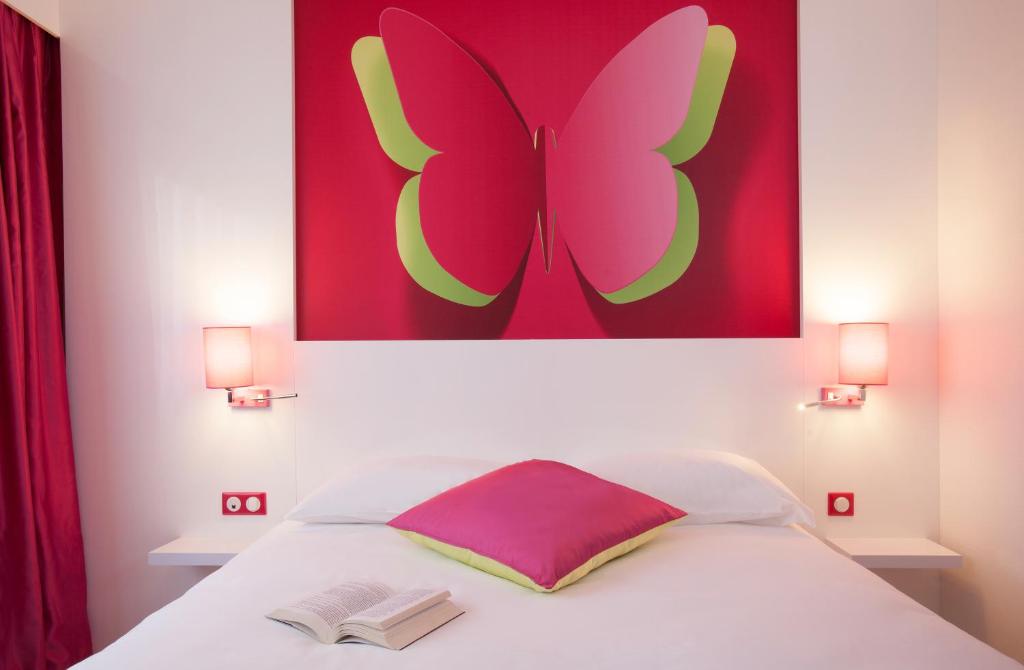 Postel nebo postele na pokoji v ubytování ibis Styles Bordeaux Saint Médard
