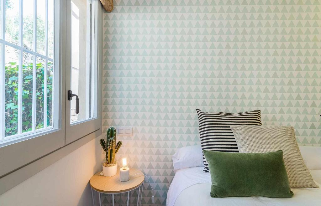 Postel nebo postele na pokoji v ubytování Bell Mar - Despierta con la brisa marina en este apartamento de la Costa Brava