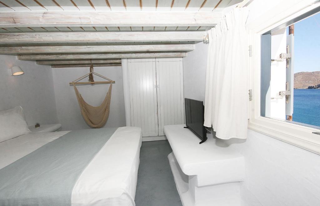 Postel nebo postele na pokoji v ubytování 5 Traditional Suites