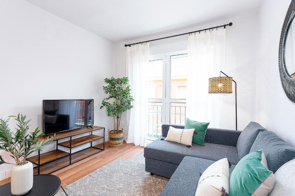 Televízia a/alebo spoločenská miestnosť v ubytovaní Genteel Home Santa Marta
