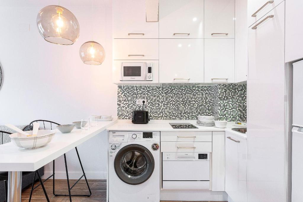 Kuchyňa alebo kuchynka v ubytovaní Genteel Home Santa Marta
