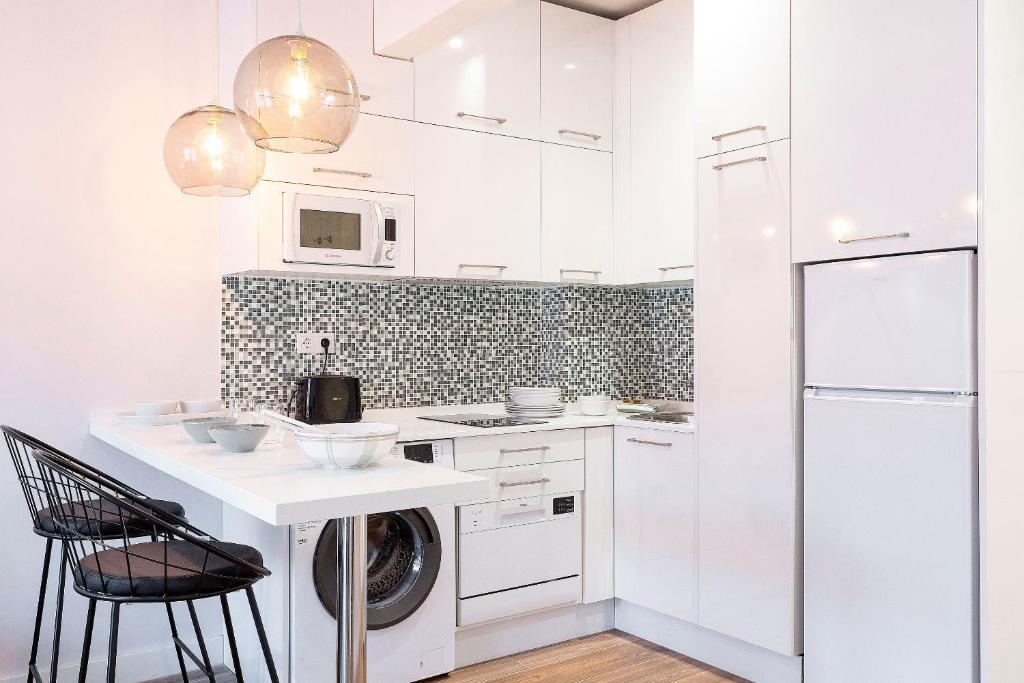 Kuchyňa alebo kuchynka v ubytovaní Genteel Home Santa Marta