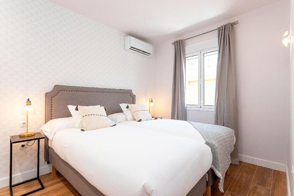Posteľ alebo postele v izbe v ubytovaní Genteel Home Santa Marta