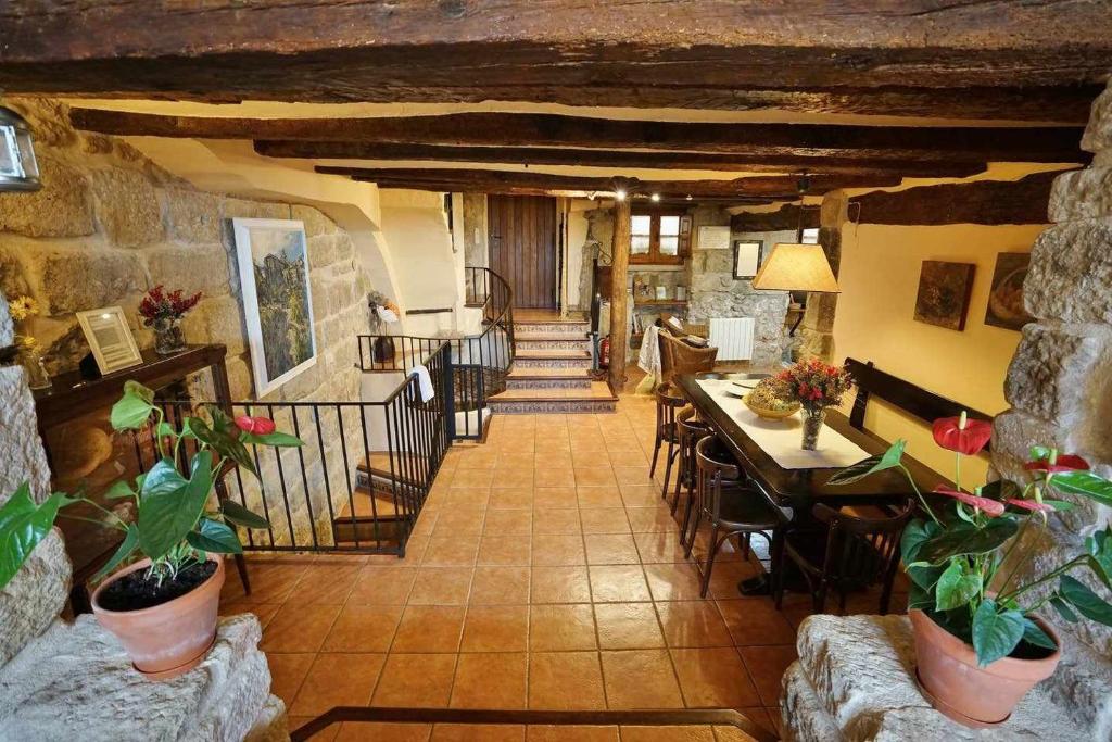 Posedenie v ubytovaní Casa rural con mucho encanto en un entorno mágico