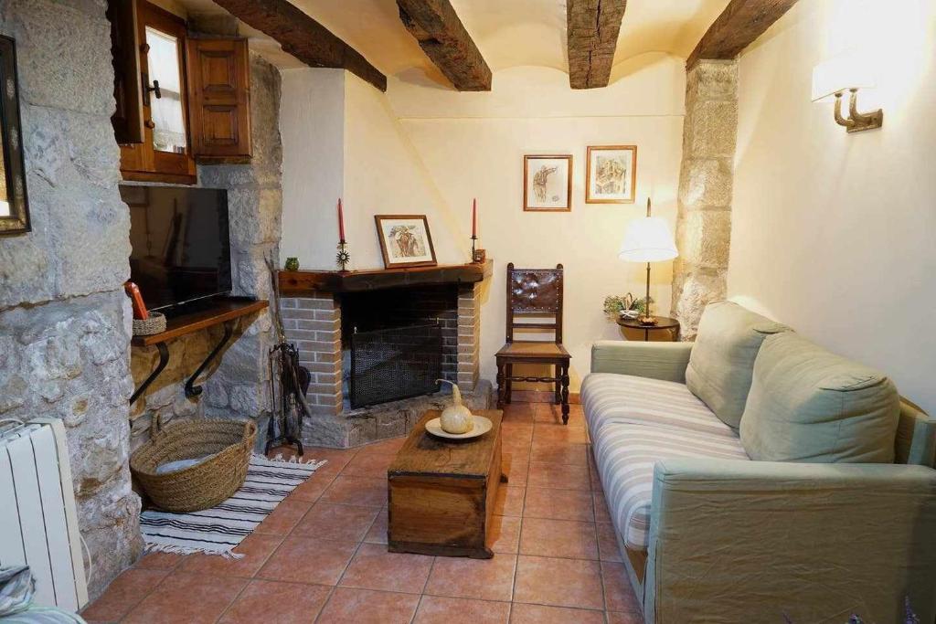 Posedenie v ubytovaní Casa rural con mucho encanto en un entorno mágico