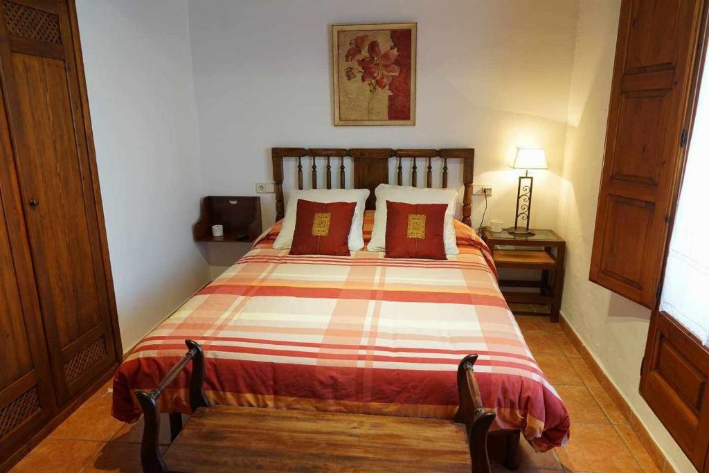 Posteľ alebo postele v izbe v ubytovaní Casa rural con mucho encanto en un entorno mágico