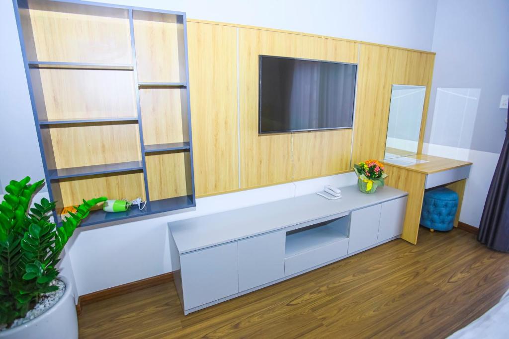 TV a/nebo společenská místnost v ubytování The Lush House
