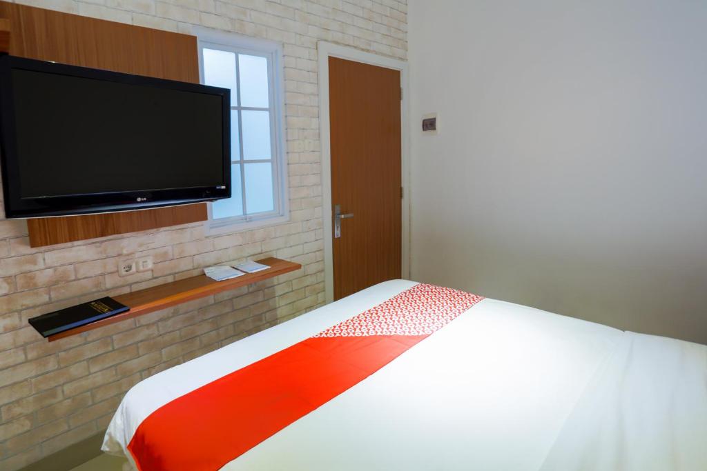 TV a/nebo společenská místnost v ubytování SUPER OYO 3109 Point Inn