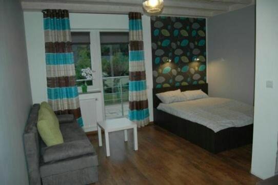 Ένα ή περισσότερα κρεβάτια σε δωμάτιο στο POKOJE SUMIK