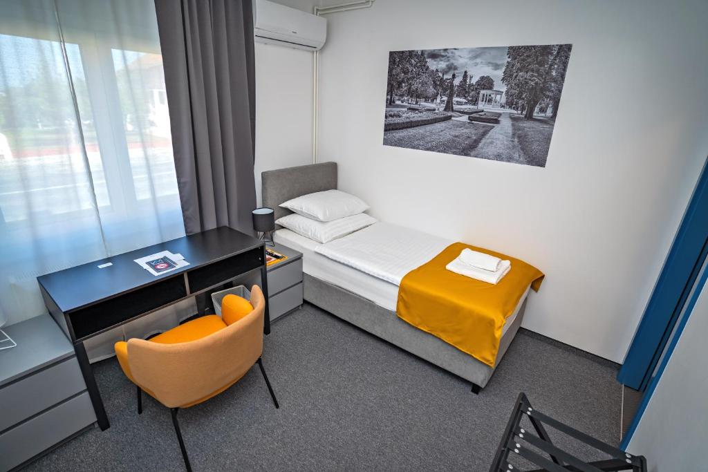 Postel nebo postele na pokoji v ubytování KM therooms BJELOVAR
