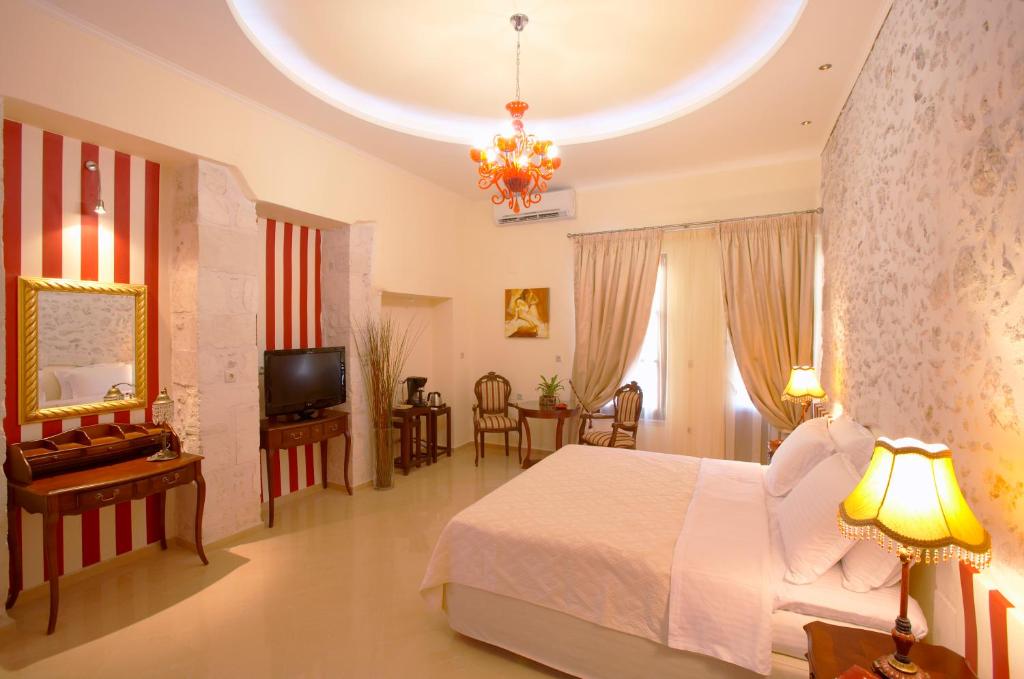 TV a/nebo společenská místnost v ubytování Casa Moazzo Suites and Apartments