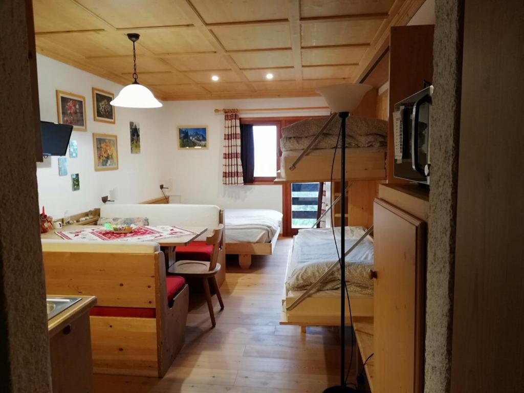 Postel nebo postele na pokoji v ubytování Casa Focobon - presso Sussy residence
